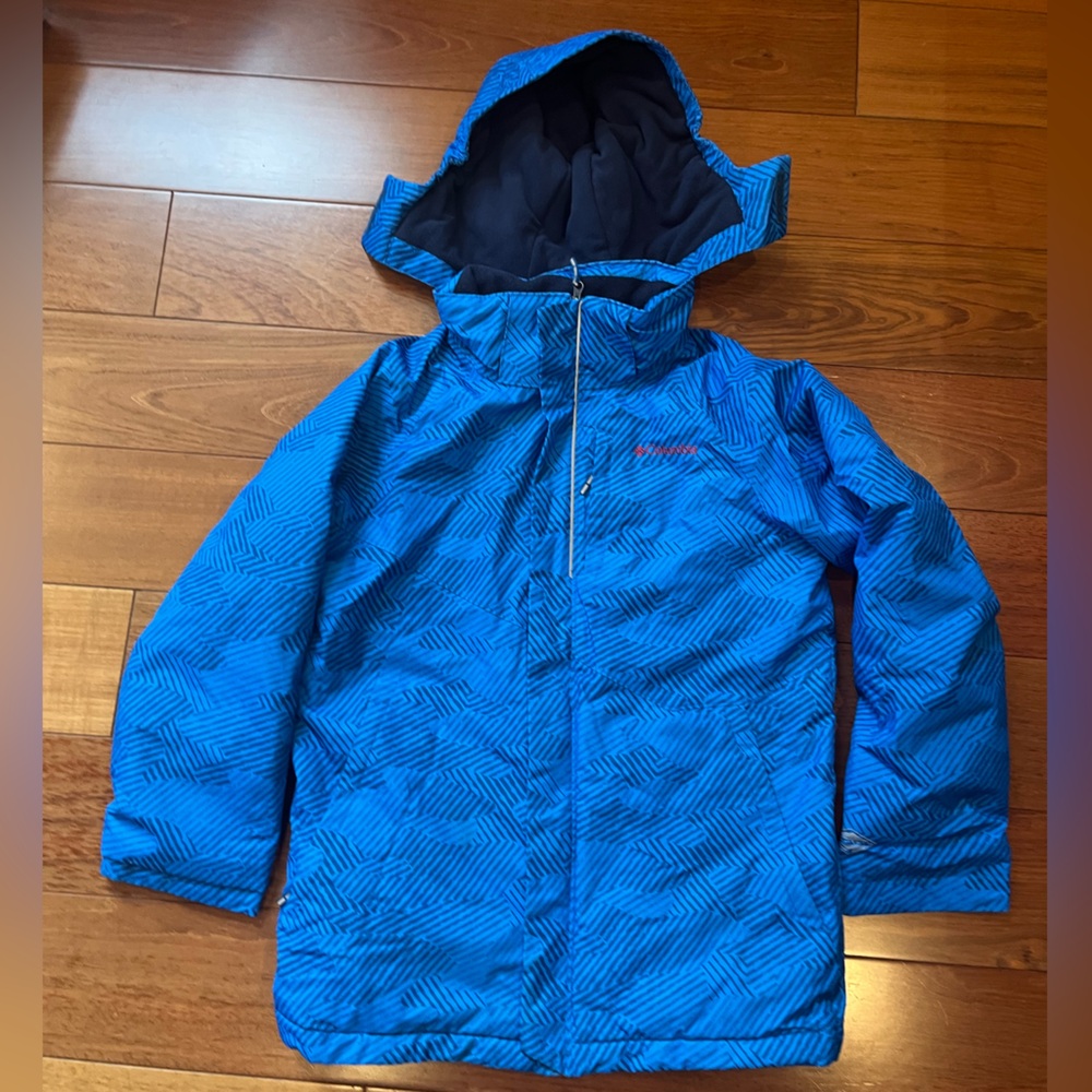 Columbia Blue and Black Hooded Jacket in Excellent used condition.